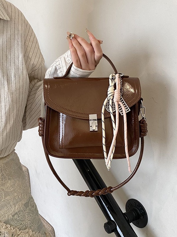Bolso de mano retro coreano para mujeres 2025, nuevo bolso de cartero universal, simple bolso de mujer de viaje casual.