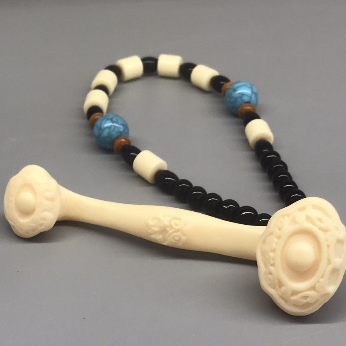 厂家直供象牙果如意手把件工艺品摆挂件随身把玩件车挂居家装饰品