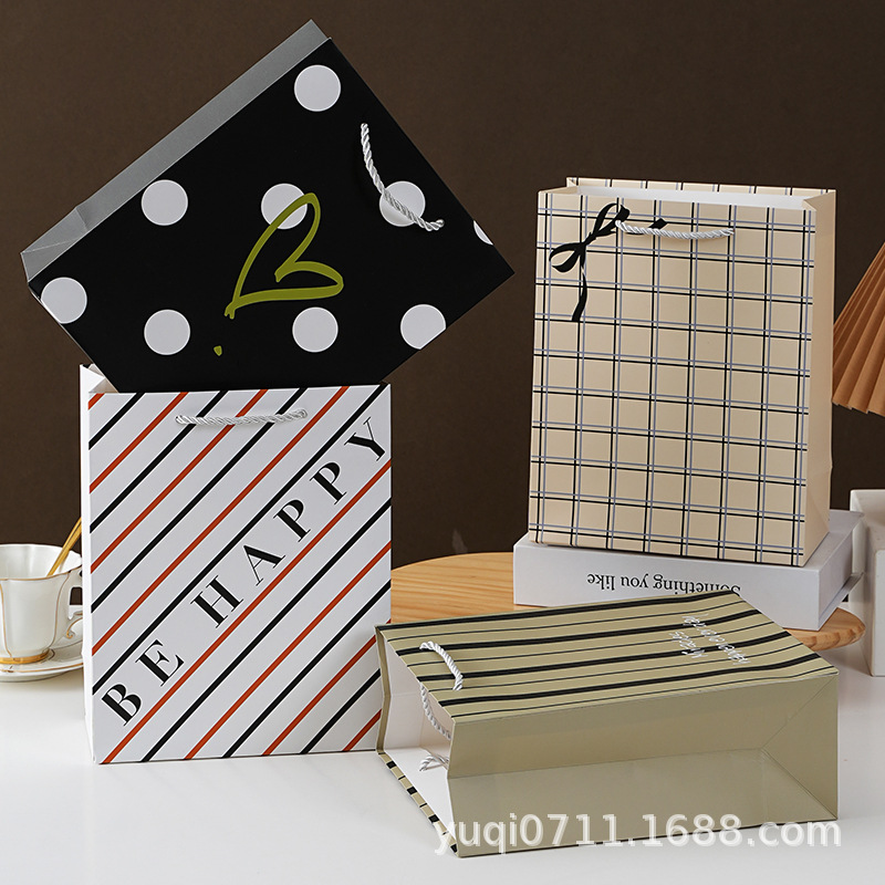 Bolsa de mano simple de alta calidad, embalaje de ropa de alta gama, bolsas de regalo, bolsas de cartón blanco, logotipo de impresión directa