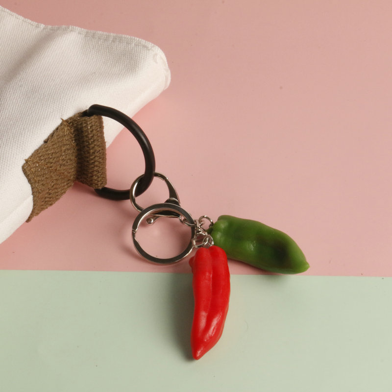Simulación en stock llavero de ajo creativo anti-perdido llavero de coche estudiante mochila colgante Chili food and play fabricante