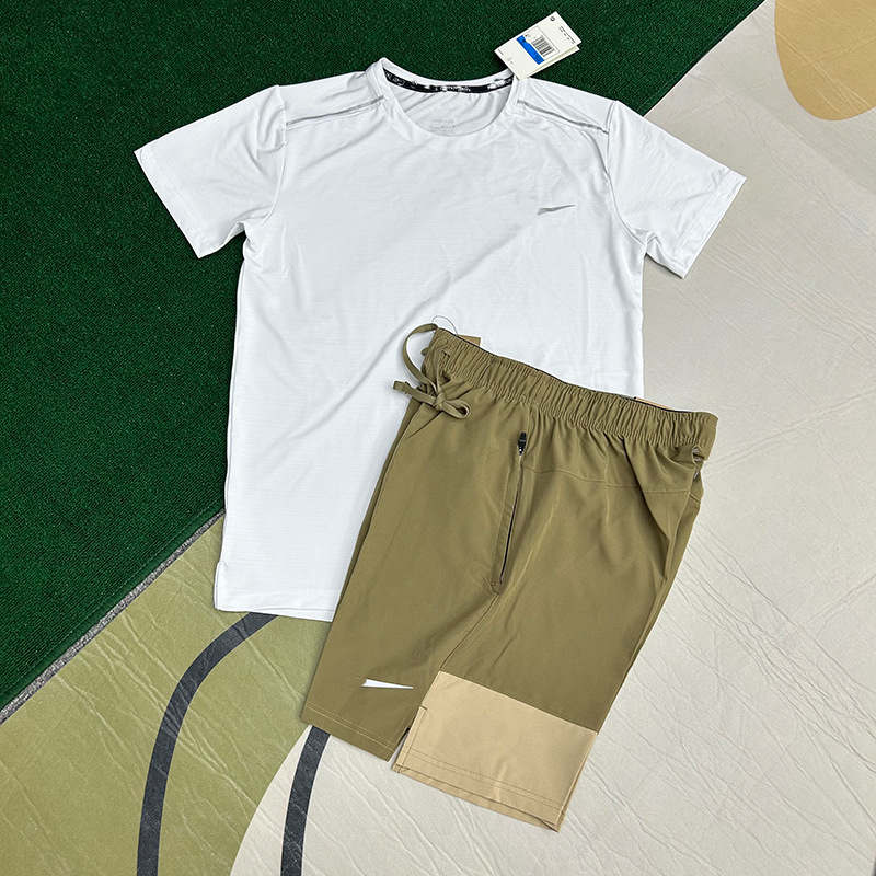 Mayorista nuevo juego de comercio exterior deportivo fitness juego de carrera rápida secado transpirable suelto ocio pantalones cortos de manga corta ropa de hombre