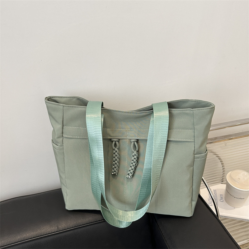 Bolsa japonesa para mujeres de gran capacidad de invierno 2024 nueva moda simple nicho bolso de hombro bolso de mano