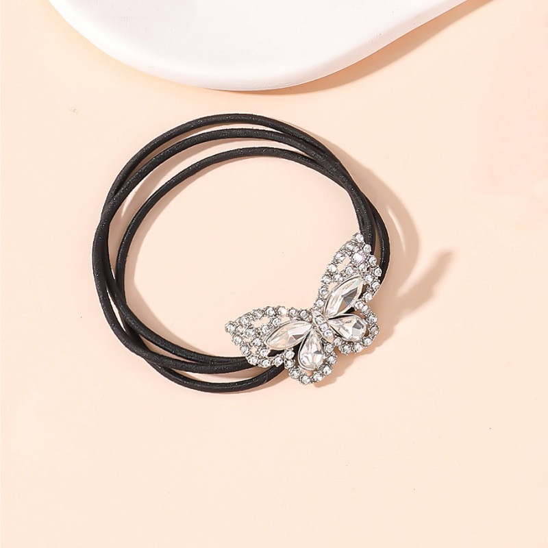 Pequeña mariposa de plata