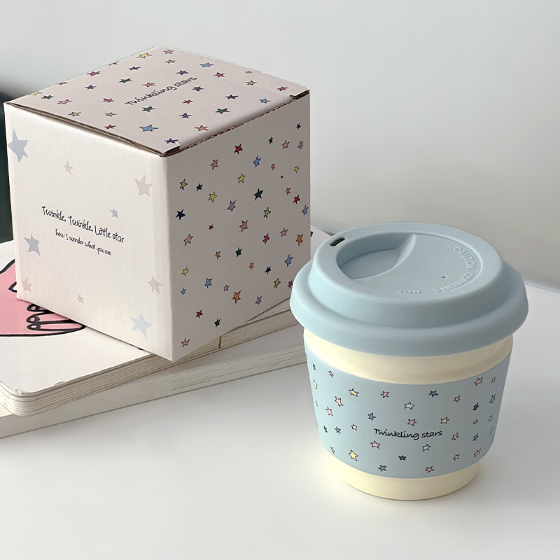 Taza de café de cerámica macaron de alto valor creativo de la serie de tazas de desayuno portátiles de mano Starins simple