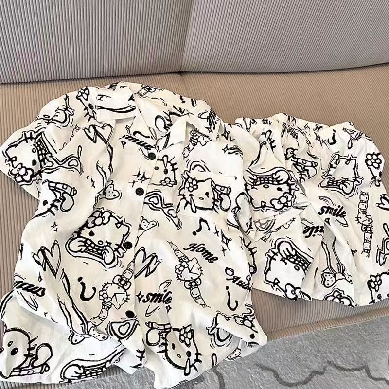 新しいインかわいい漫画 KT 猫パジャマ女性の夏の半袖ショーツ高価値寮ホーム服 2 点セット|undefined