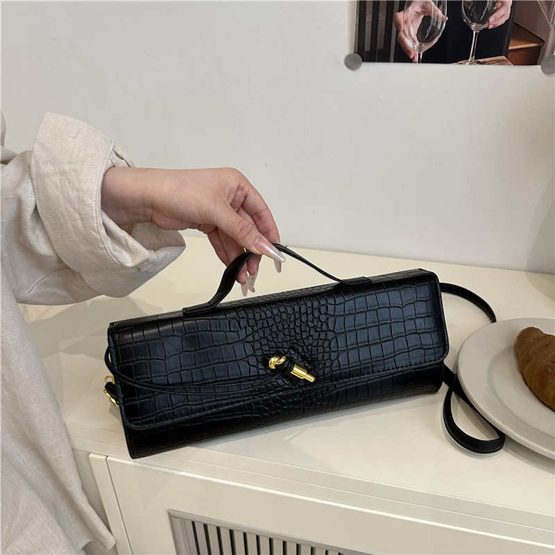 2025 verano temperamento tendencia nuevo temperamento bolso de palo francés con bloqueo diagonal bolso horizontal bolso de mensajero de un solo hombro bolso femenino