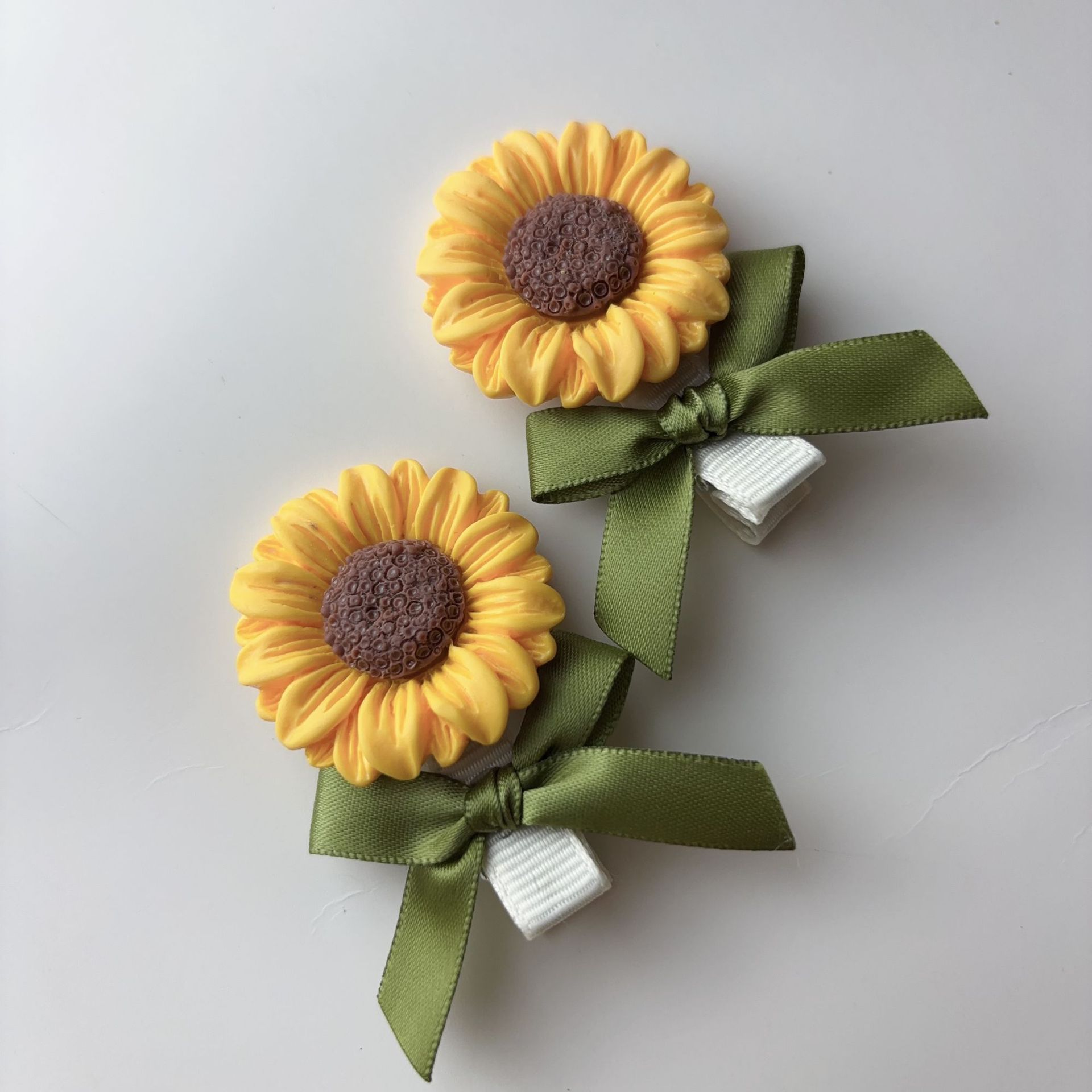 Fermaglio per capelli con fiocco e girasole stile foresta_voghion.com