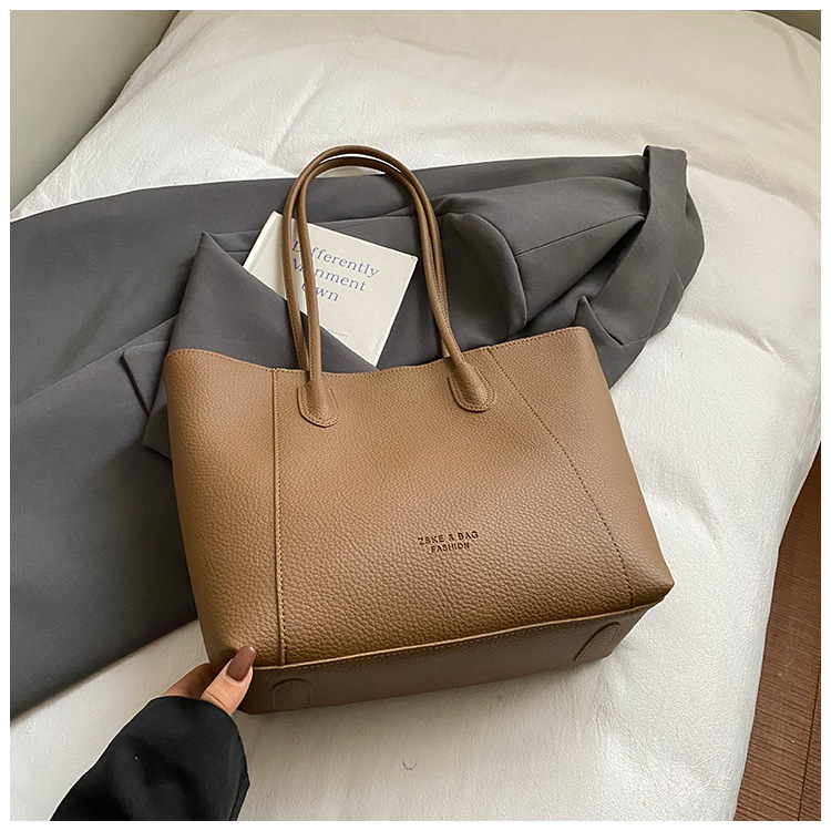 Casual bolsa de gran capacidad para mujeres 2025, nueva ciudad coreana simple alta sensación de viaje de moda bolso de hombro