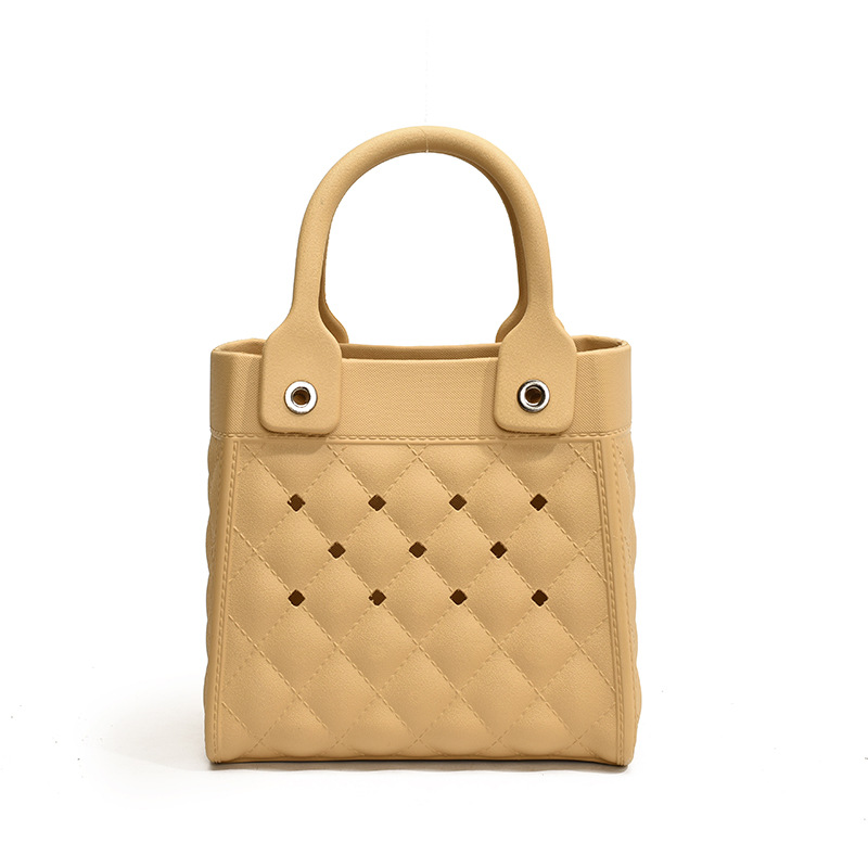 Bolso Tote de moda coreana 2025 verano nuevo estilo bolso femenino agujero hueco bolso de mano moda ringge bolso de playa marea