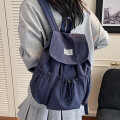 カジュアルで多用途な巾着ナイロンバックパック女性ニッチトレンド大容量フリップ学生バックパック女の子のための