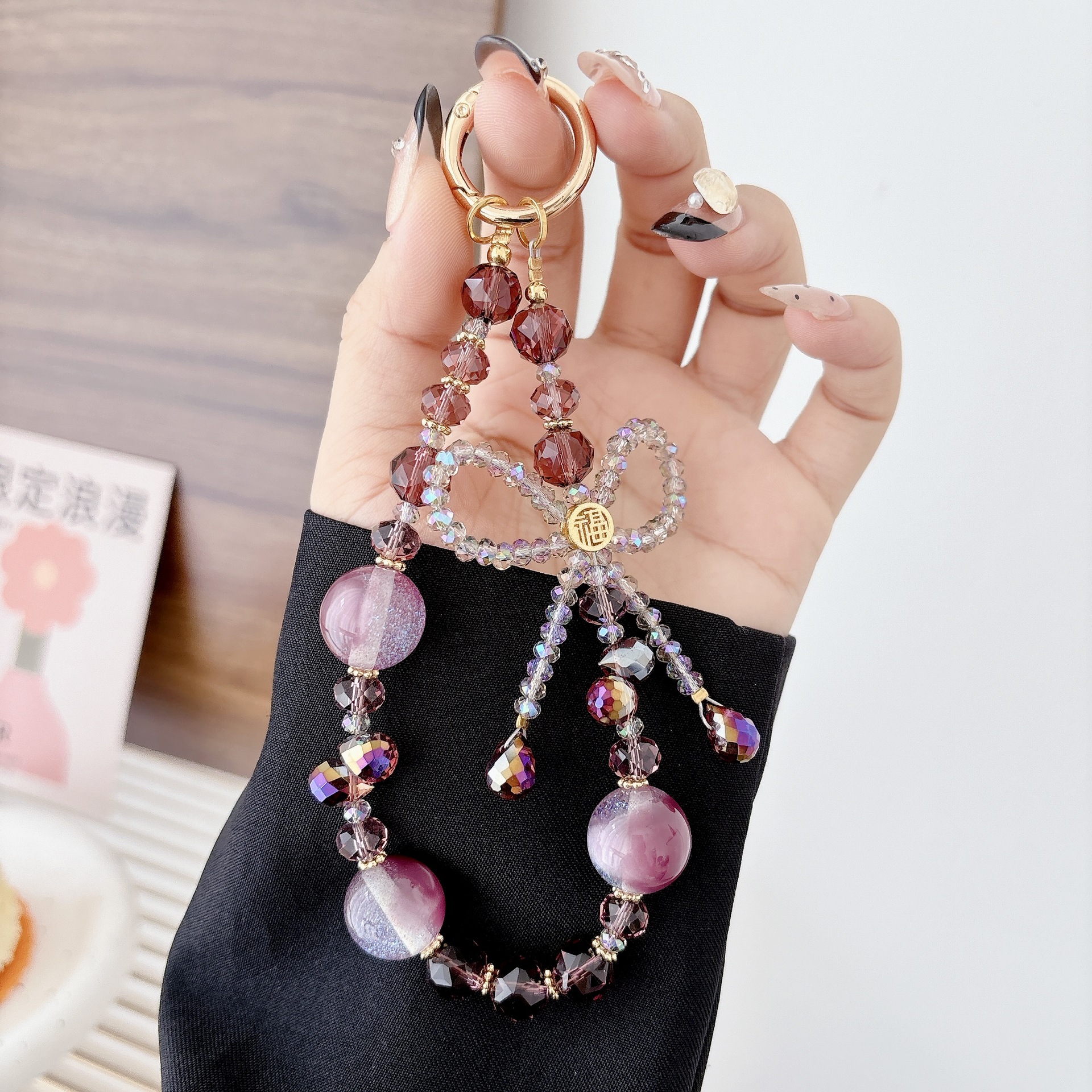 El arco de lujo ligero de lujo de alto nivel puede luchar, cadena de teléfono móvil, colgante de teléfono móvil, bolso, llavero, colgante, nicho de diseño