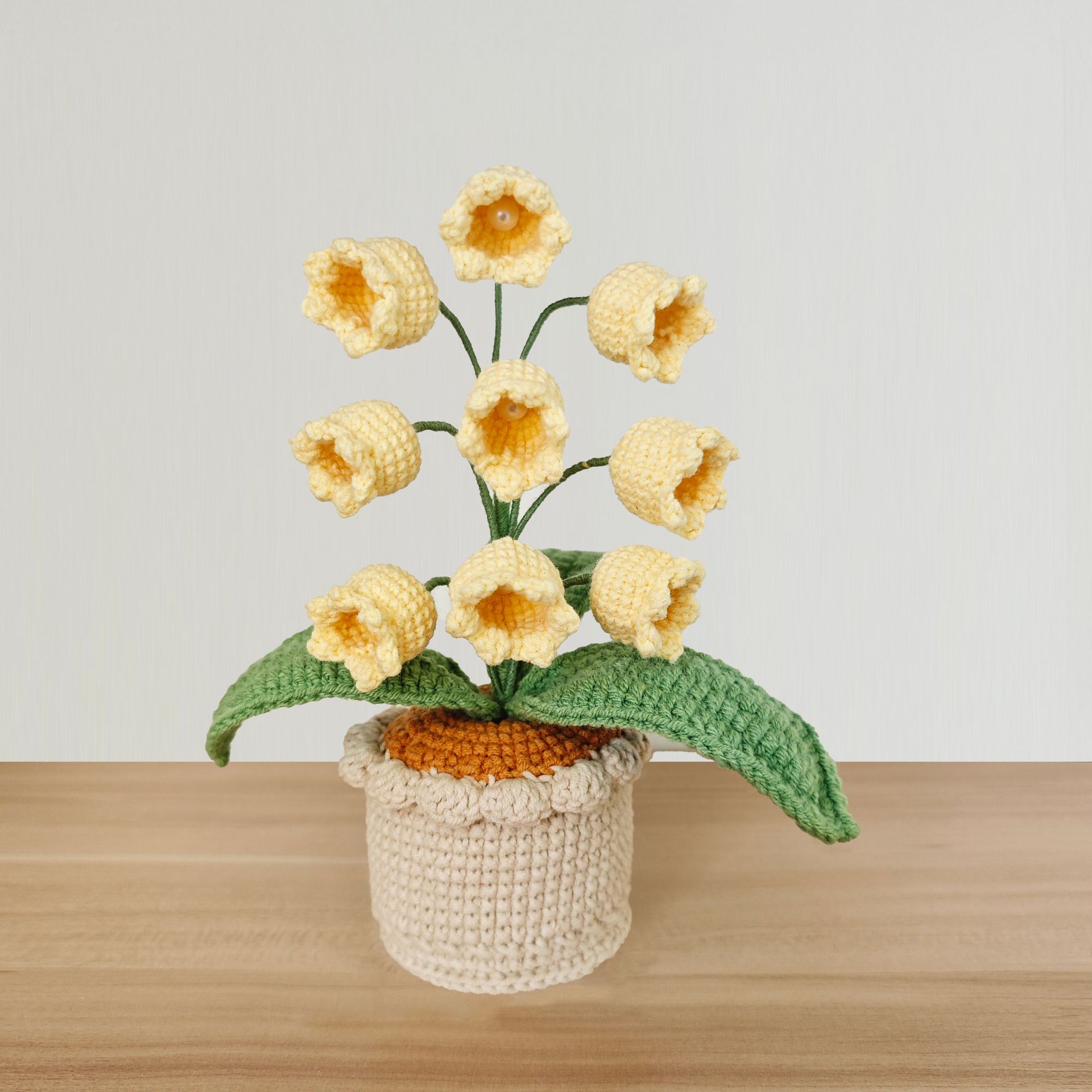 Transfronterizos productos terminados de venta caliente orquídea de campana simulación de gancho artesanal en maceta flor de lana decoración de escritorio de dormitorio