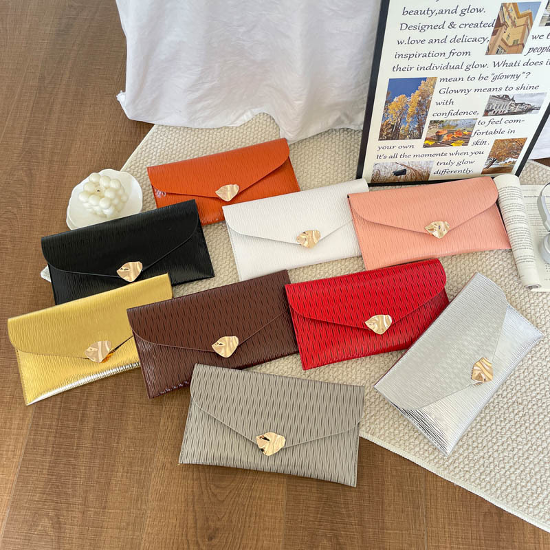 Casual simple estilo exterior de moda sobre de mano bolsas de mujer verano 2026 nuevo nicho coreano diseño textura de viaje