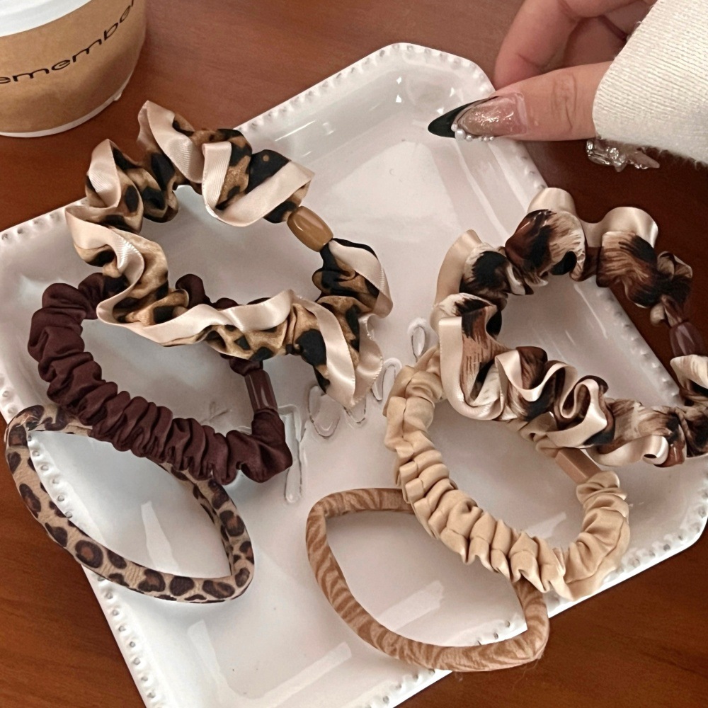 Japón y Corea del Sur de alto valor de toalla de estampado de leopardo 3 piezas conjunto de temperamento de niña simple atado cuerdas para el cabello adornamiento