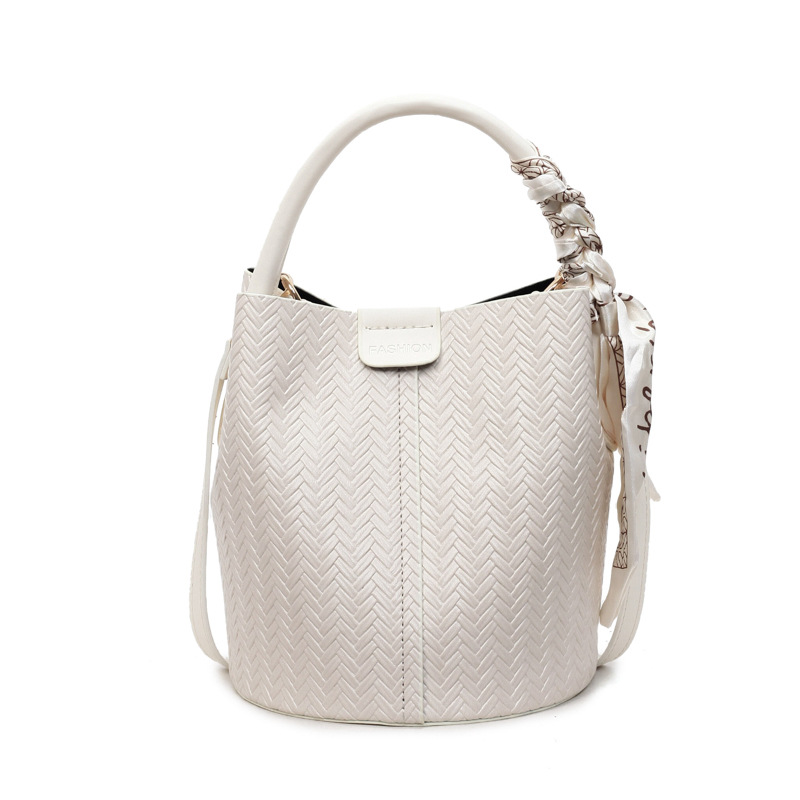 Bolso de mano transfronterizo retro simple bolso de cubo de agua mujer otoño / invierno 2025 nuevo estilo versátil bolso de hombro bolso de transporte