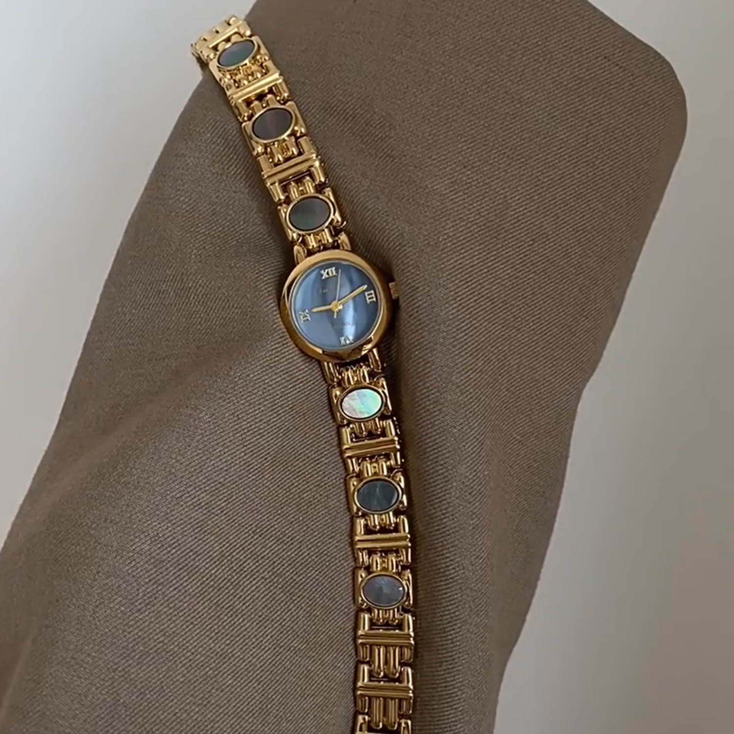 Retro gold and blue [mother-of-pearl chain]