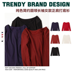 秋冬の新型の純色のシンプルな丸首の長袖のtシャツの女性の韓国版の修身はやせています。