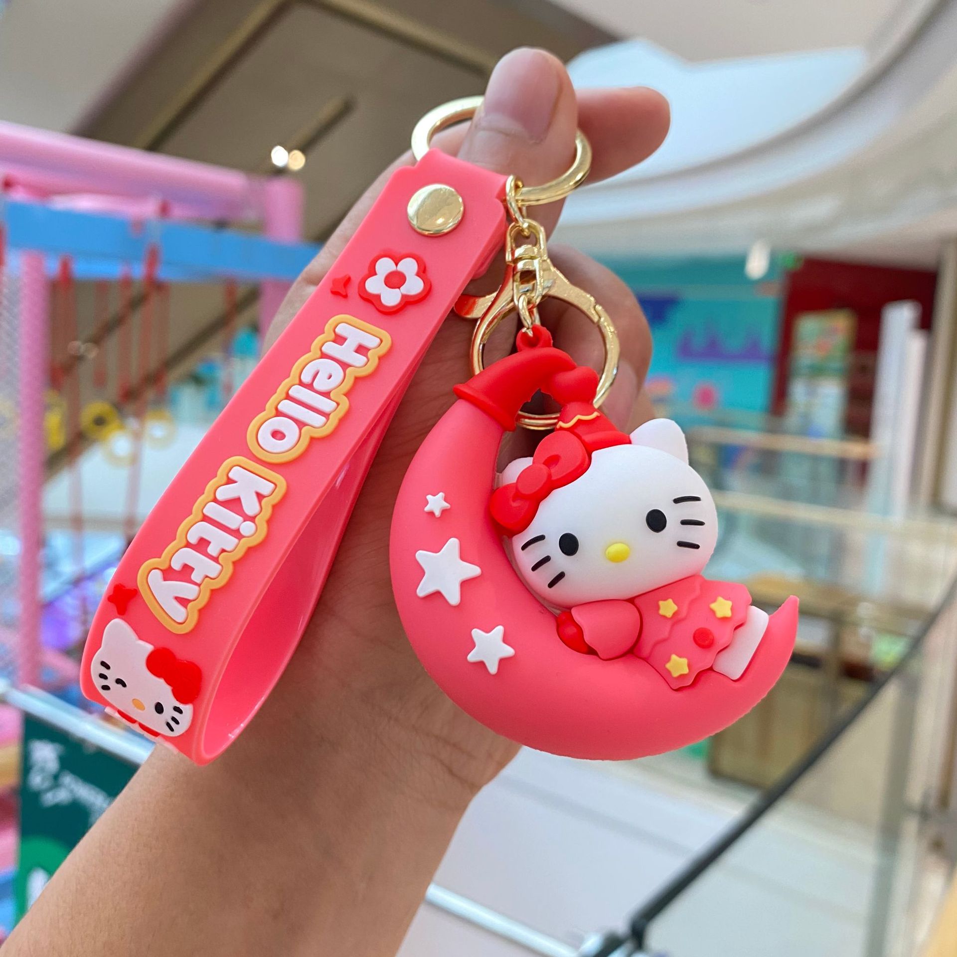 Sanrio sentada luna llavero melodía coolomi muñeca coche bolsa colgante muñeca máquina regalo al por mayor
