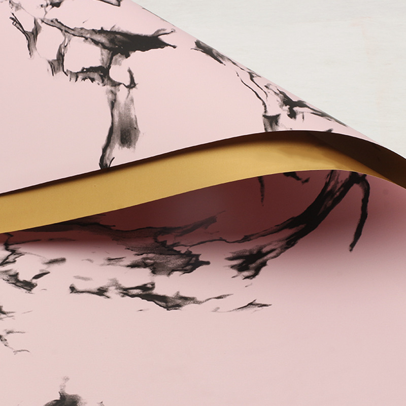 Huaxi comercio exterior transfronterizo mayorista oro lujo papel impermeable mármol oro papel de flor florista papel de embalaje