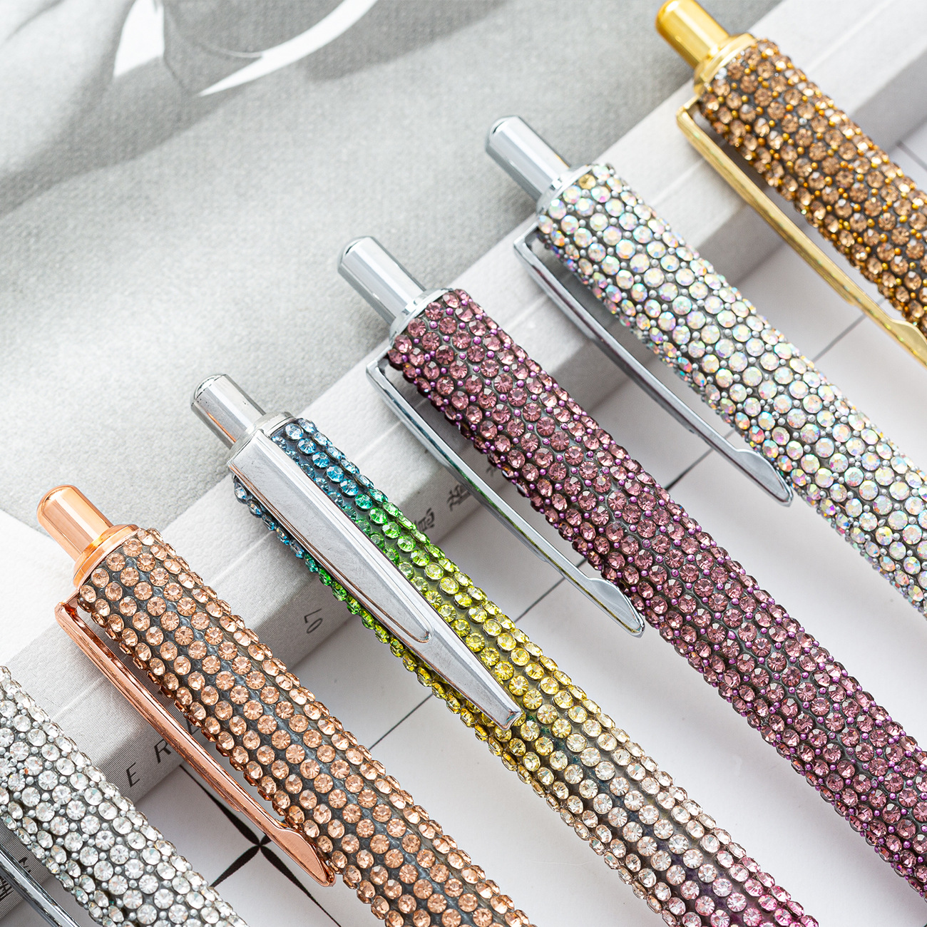 Presione bolígrafo de pulsación en stock mayorista prepucio de diamante bolígrafo de pulsación de papelería bolígrafo de pulsación de pulsación de pulsación de pulsación