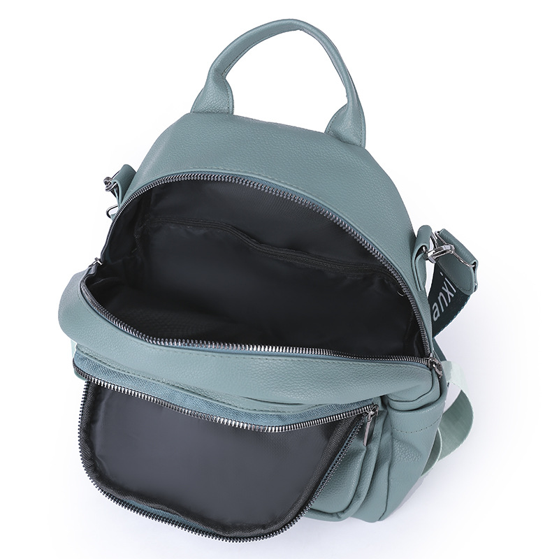 Mochila de sentido de alta gama para mujer 2022 nueva mochila de cuero suave coreana mochila de doble uso de todo fósforo de moda mochila escolar al por mayor