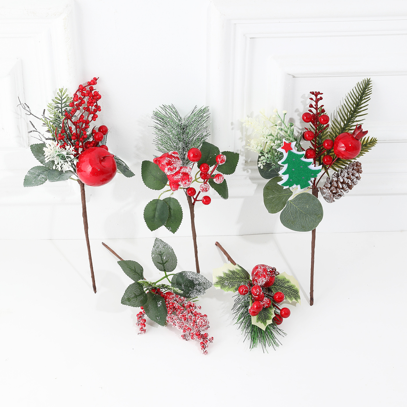 Nuevo transfronterizo de imitación verde con nieve pinos rojos pinos pinos pinos decoración de hojas de lujo diseño de decoración del hogar