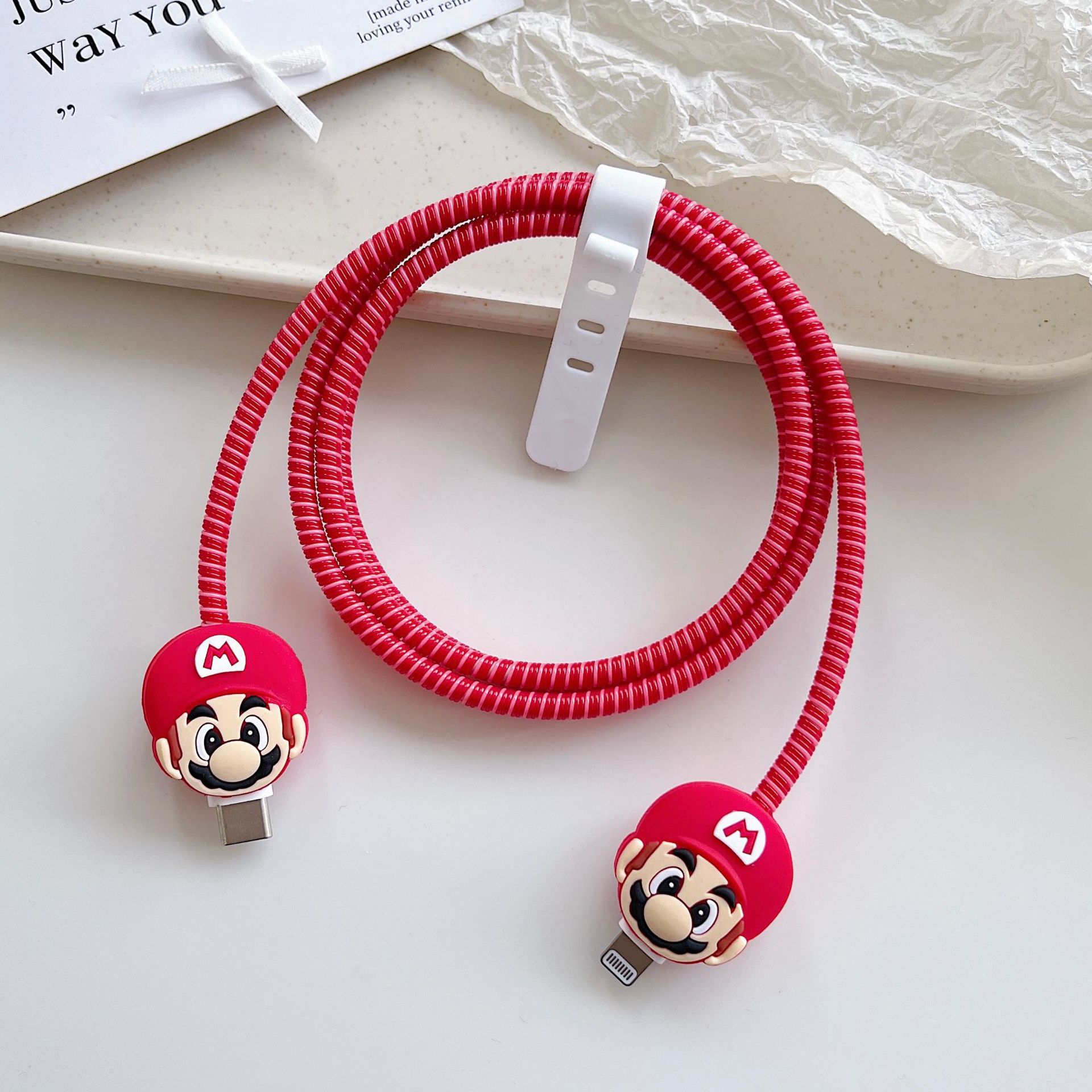 Amazon cartoon cable de datos cubierta adecuada para Apple Android cable de datos de carga rápida cuatro piezas en stock al por mayor