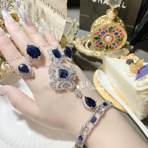 SIsi designs light luxury high-grade imitation natural diopside set, micro-paved blue corundum colored gemstone temperament and versatile ring