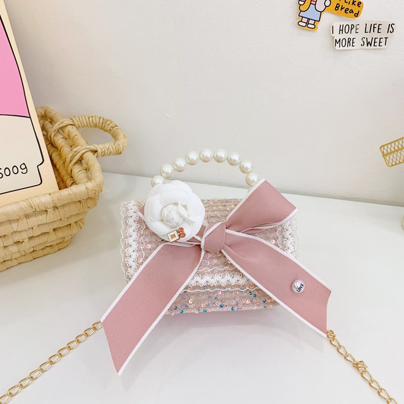Otoño y invierno coreano arco camellia bolsas de niños de encaje de mano perlas bolsas mochilas para niñas de jardín de infantes