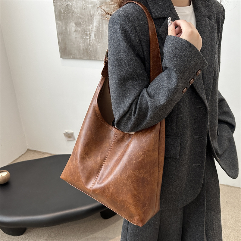 2025 primavera nueva moda bolsos de mano de hombro de gran capacidad bolsos tote bolsos de mujer bolsos de viaje bolsos versátiles para mujeres