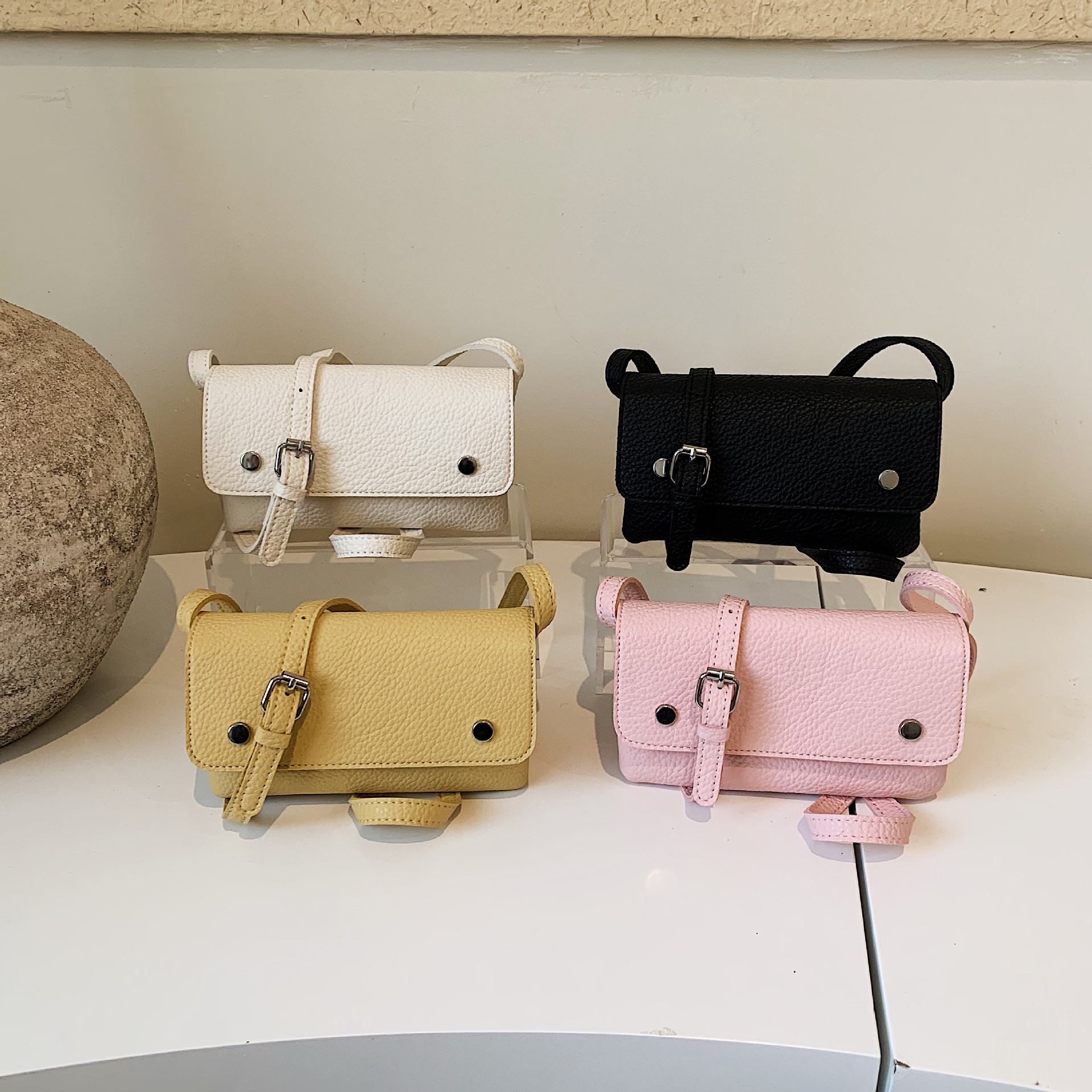 Nicho coreano de transporte universal bolso pequeño para mujeres verano 2026 nuevo multicapa sensación diaria de hombro mochila
