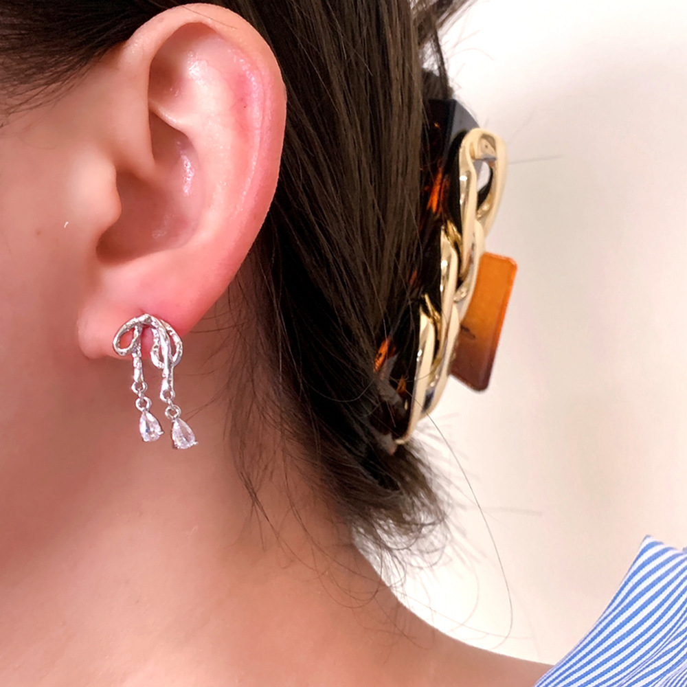 Cute elegant earrings with bow with zircon