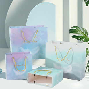 in stock White Cardboard Handbag Clothing Cosmetic Packaging Bag Fresh Paper Bag Feather Teacher's Day Gift Bag