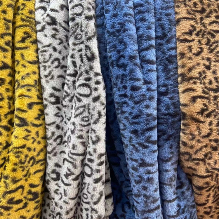 Pequeña piel de conejo impreso anillo de leopardo Imitación Piel de conejo franela ropa abrigo bolsa tela felpa alfombra de juguete tela en stock