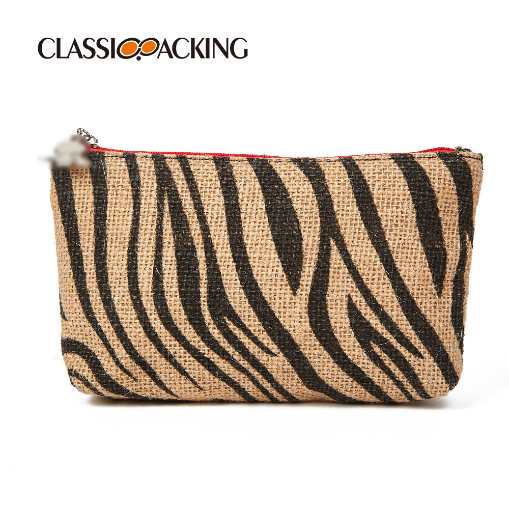 Bolsa de cosméticos al por mayor de fábrica Bolsa de almacenamiento de patrón animal popular transfronterizo Bolsa de embrague de material tejido con logotipo