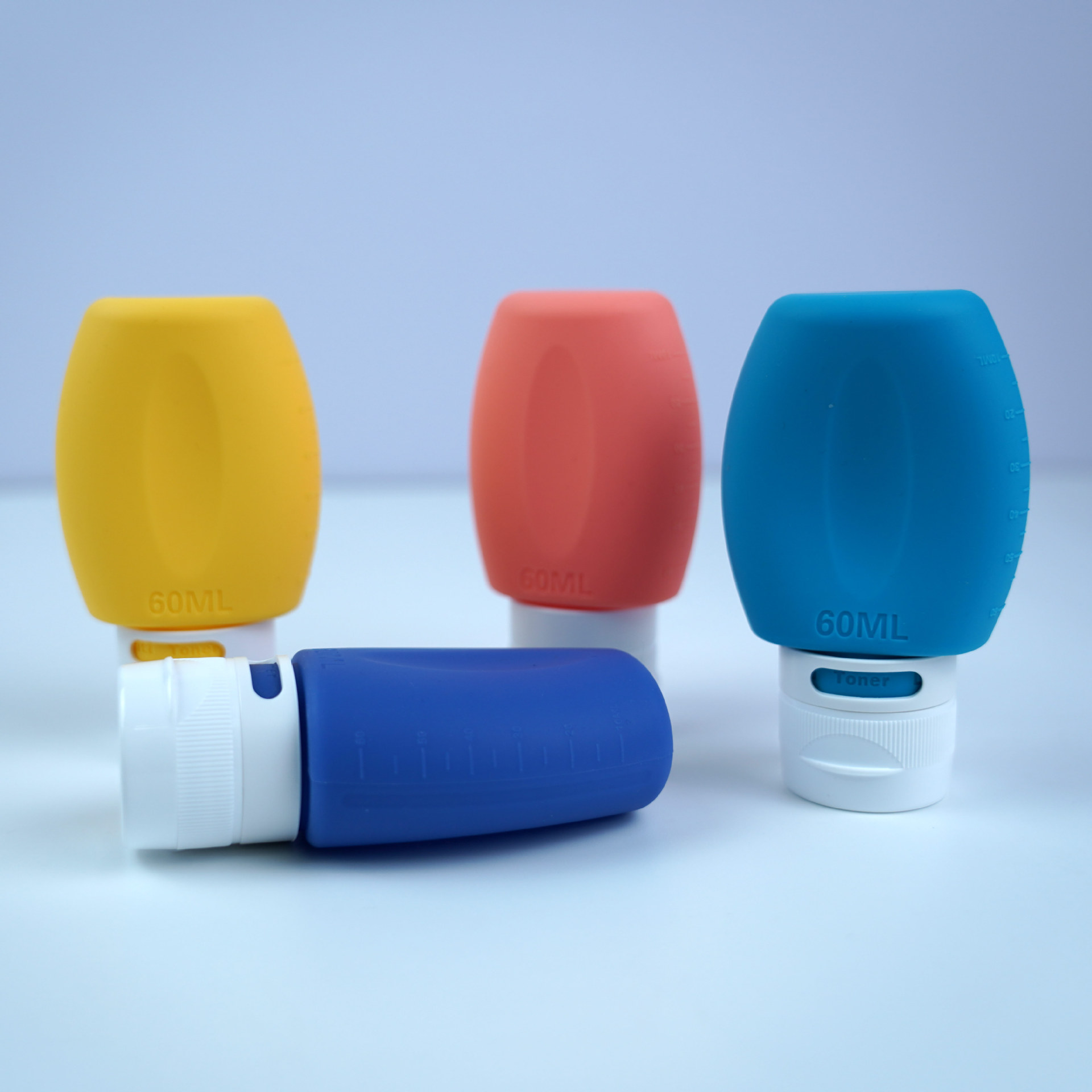 Botella dispensadora de silicona de grado alimenticio, botella exprimible, juego de botellas de almacenamiento portátiles para viaje, fabricante de suministro transfronterizo