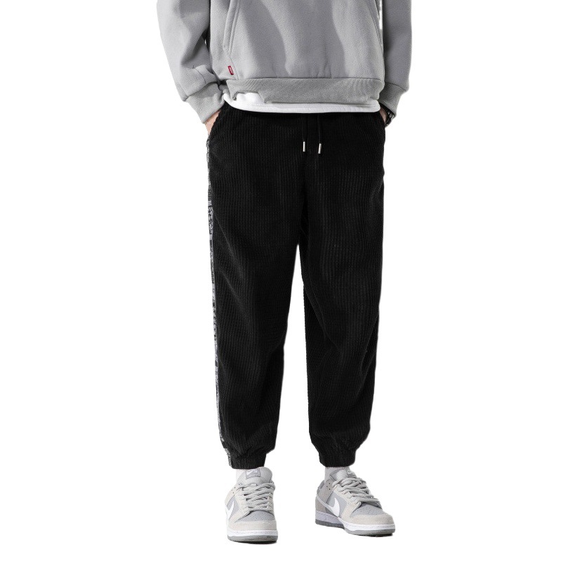 2025 primavera nuevo estilo chino tendencia nacional pana hombres Casual anacardo flor patchwork estilo japonés pantalones deportivos de gran tamaño