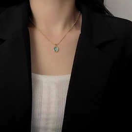 海蓝猫眼石项链女2023年新款钛钢法式高级感设计锁骨链复古毛衣链