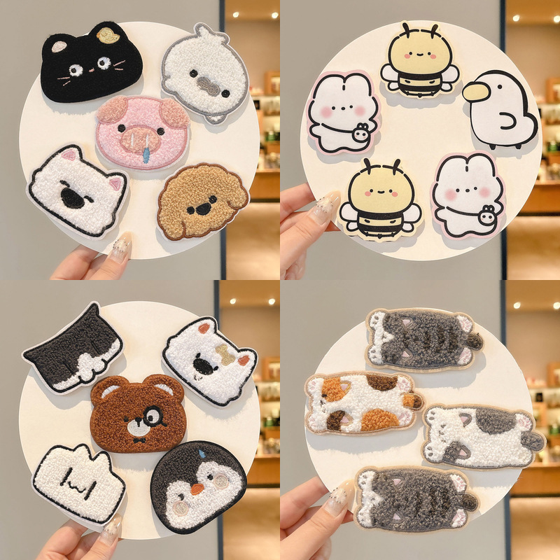 Sweet autumn and winter hair accessories for women, featuring a cartoon design and a fun, playful style, with a new 2026 collection of cute children's hair clips
