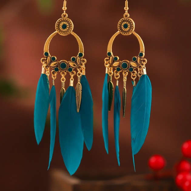 Pendientes de borla de cuentas de arroz con plumas de gota de agua bohemia Pendientes de estilo de vacaciones retro de nicho Pendientes de estilo étnico de lujo ligero