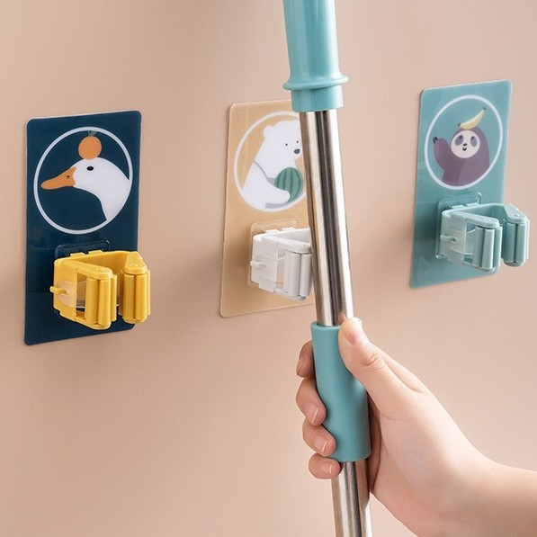 Gancho de trapeador sin punzonado Soporte de trapeador de baño de dibujos animados sin costuras Gancho de almacenamiento de escoba Clip de trapeador autoadhesivo fuerte