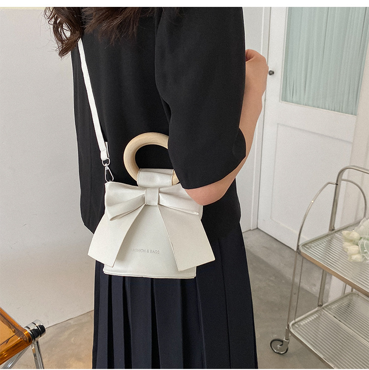 455g Weight Synthetic Leather Lining Material Sewing Thread Fashion Element Magnetic Buckle Closure Type Single Shoulder Strap, Double Handle Strap Type Bucket Bag Bags Type Casual Occasion Pu Leather Material Bow Knot Pattern All Seasons Season Women's Gender Elegant Style Bucket Shape Small Size Women's Small Pu Leather Bow Knot Elegant Sewing Thread Bucket Magnetic Buckle Bucket Bag 16