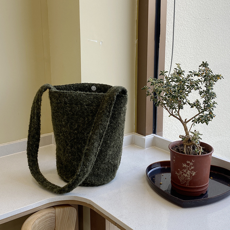 Solid color plush with bucket: moss green