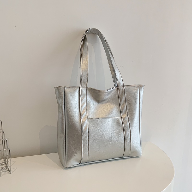 Bolsa de gran capacidad para mujeres 2024 nuevo estilo americano bolsas de compras de mano textura bolsas de hombro pu bolsas casuales simples