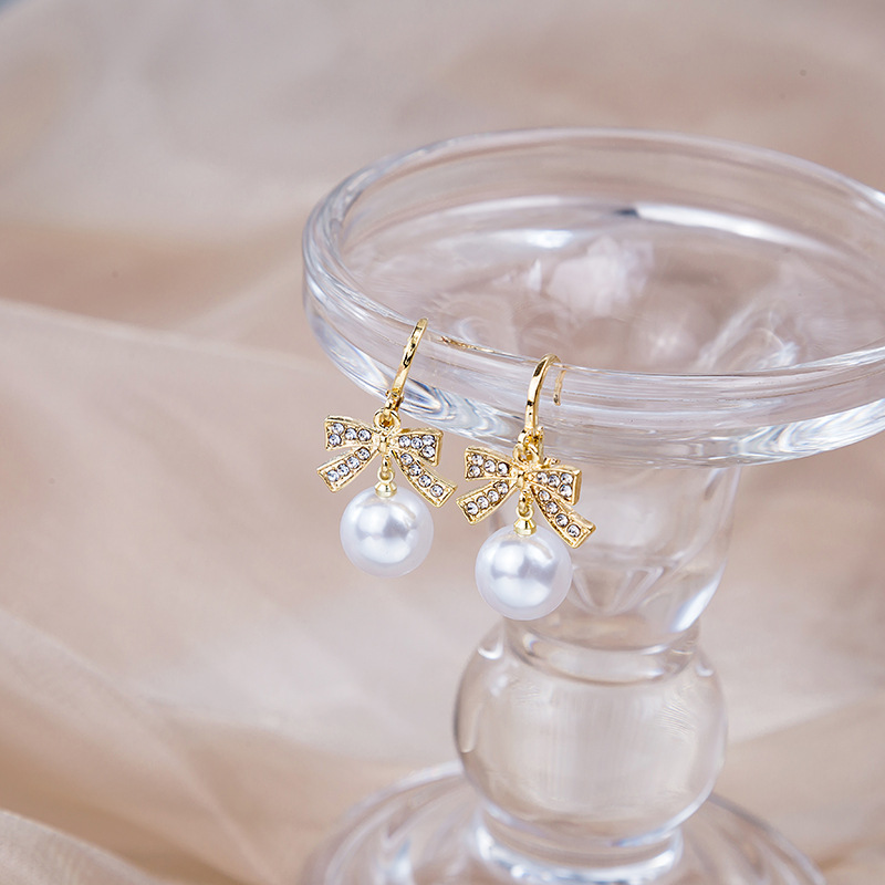 Fashion Diamond Bow Pearl Simple Alloy Drop Earrings display picture 1