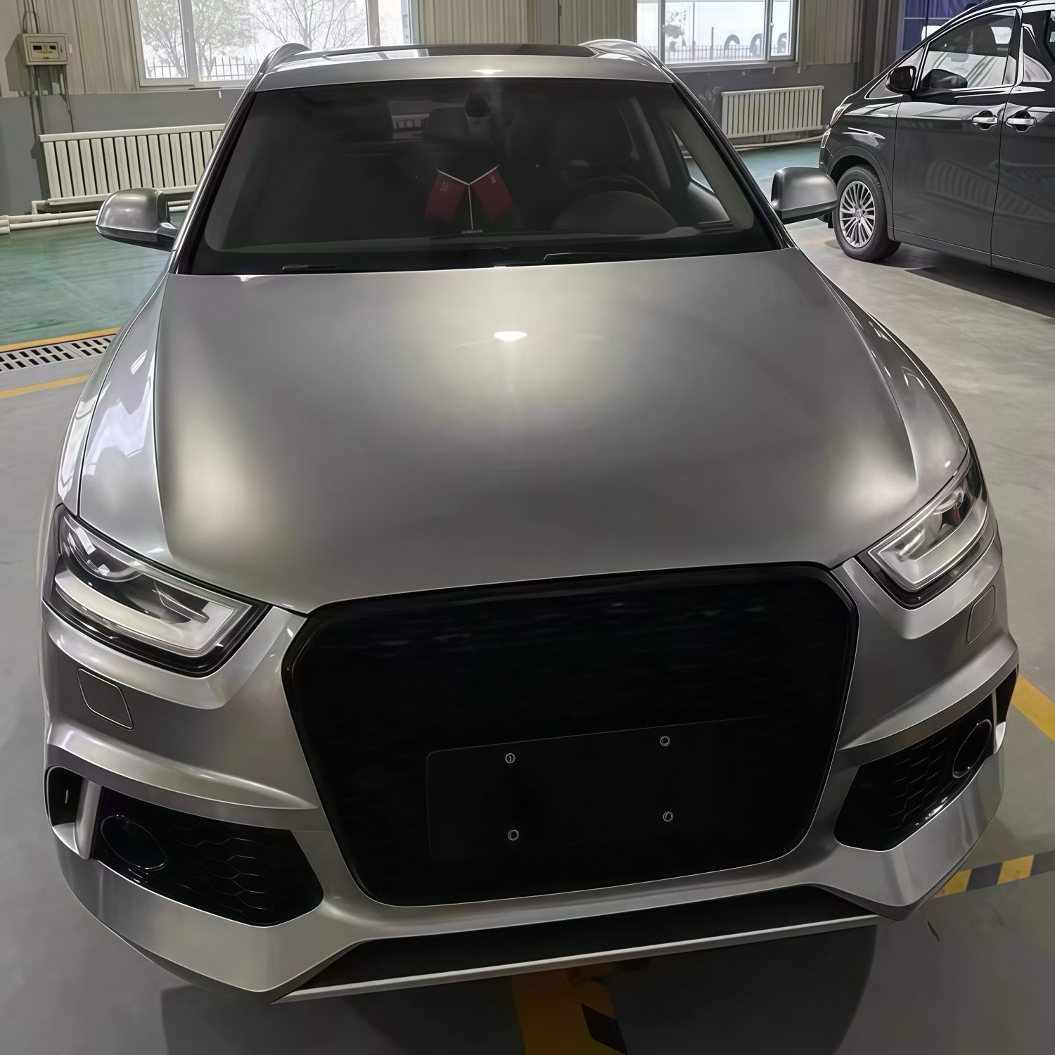 Suitable for Audi Q3 models from 2012-2015, this is an RS Q3-style front bumper, front grille, and front fascia kit