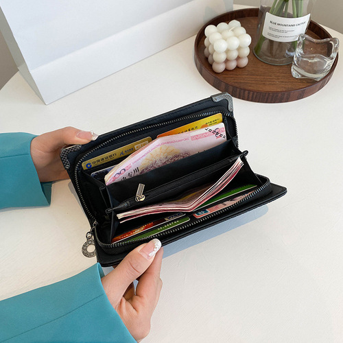 New  skull fashion personality long women's wallet punk women's clutch multi-card slot mobile phone bag