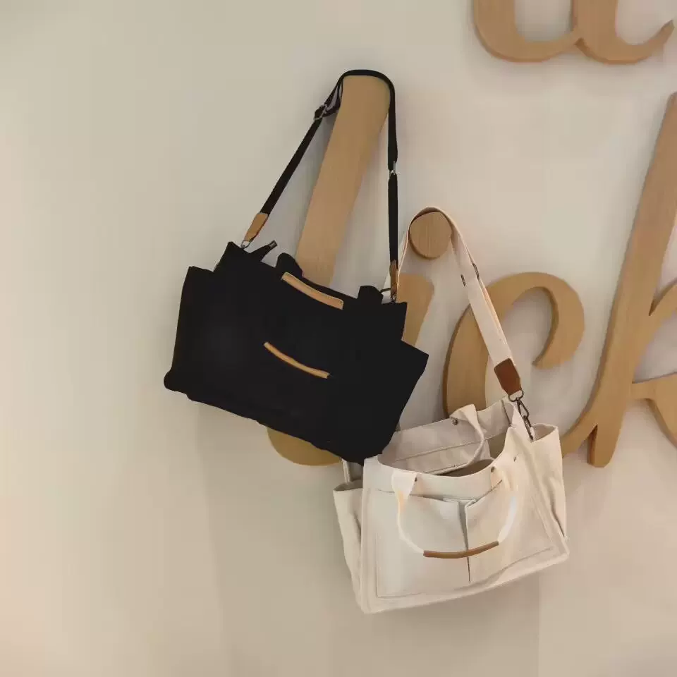 大容量帆布包女斜挎包韩国多口袋时尚妈咪包通勤百搭手提单肩包潮