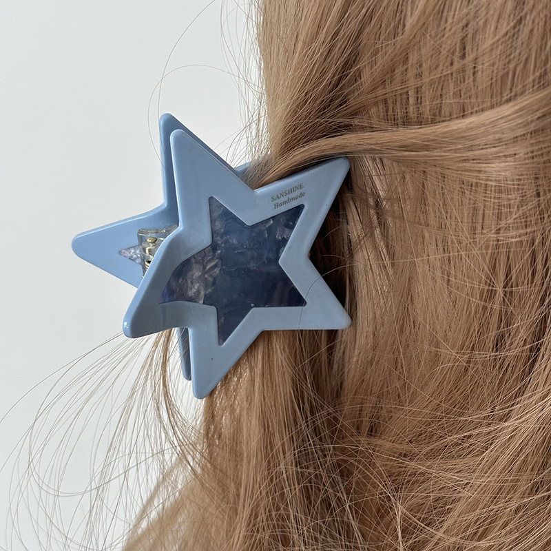 Gouden haarklem met ster design elegante haarclip voor dames_voghion.com