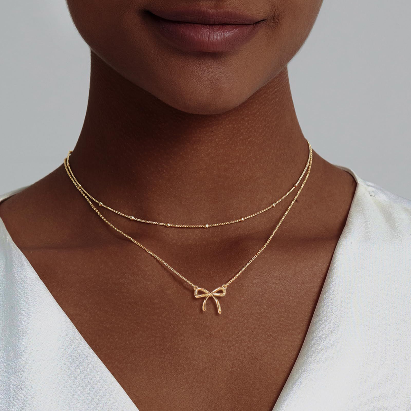 Hoogwaardige Europese en Amerikaanse grensoverschrijdende kleine hanger met fijne ketting, compacte strikketting, lichte luxe choker_voghion.com